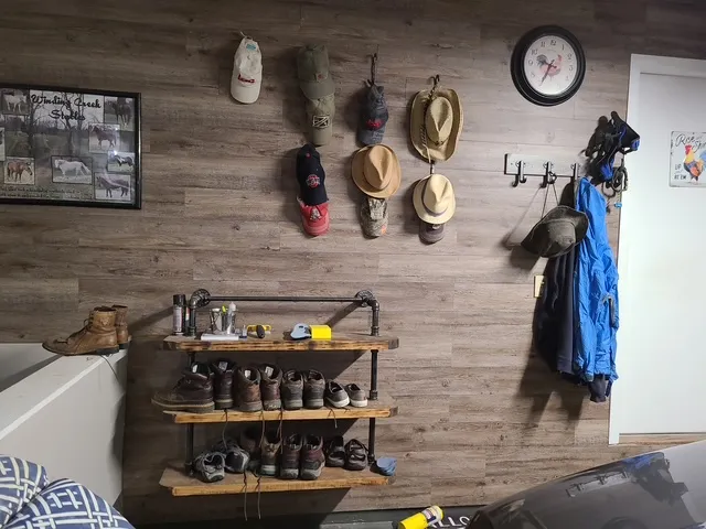 Mudroom with hooks and open shelving